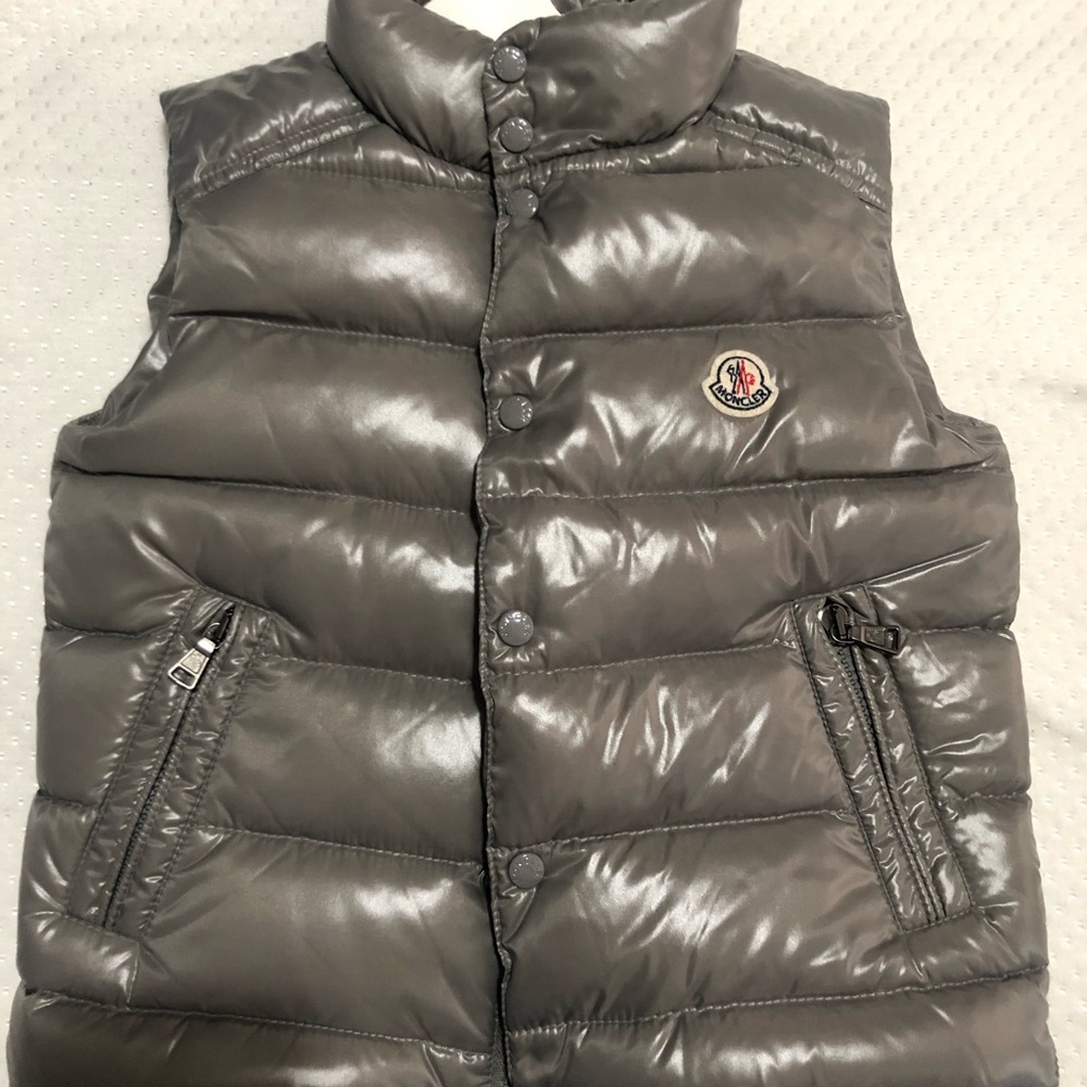 Moncler Vest boy or girl can wear it. Never been used Runs small